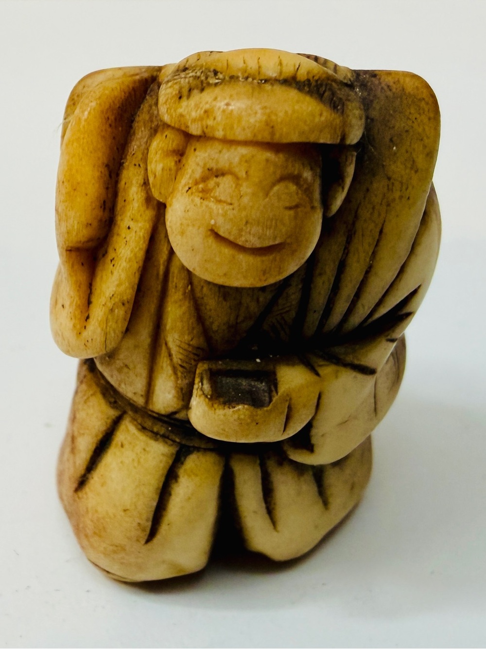 Carved Bone Netsuke-Style Traveler Figurine